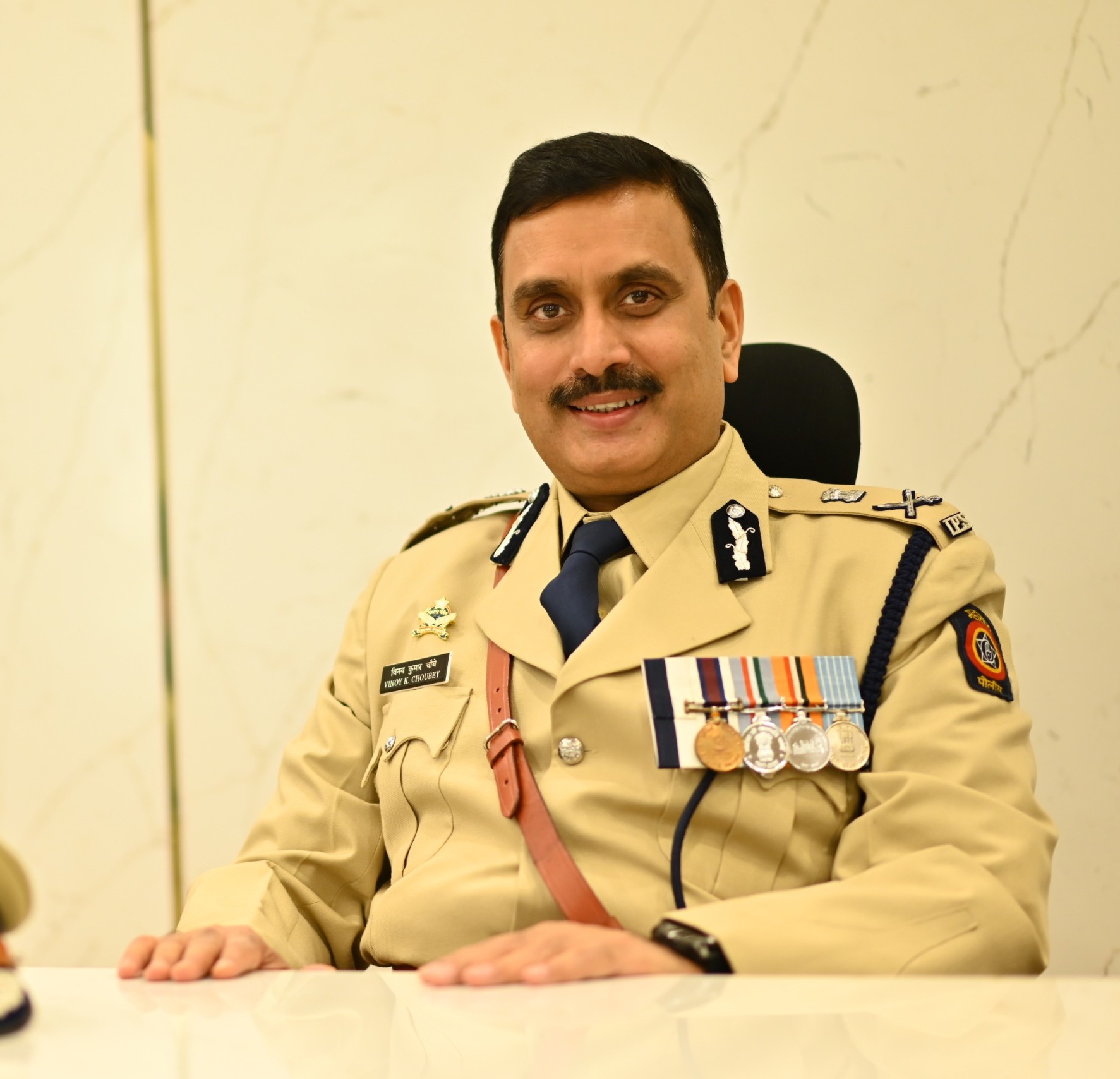 Vinoy Kumar Choubey, IPS, in service uniform at his office desk as Commissioner of Police, Pimpri-Chinchwad.